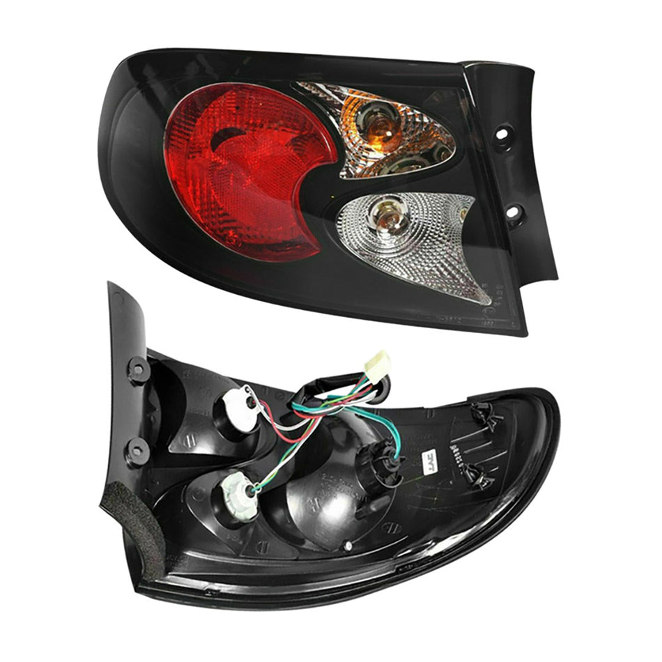 Holden Commodore VT / VX / VY / VZ (1997 - 2007) Black Altezza Halogen OEM Style Tail Lights LH + RH
